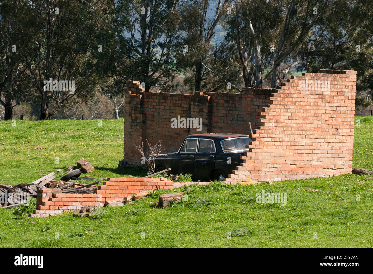 Going nowhere… car inside a ruined garage on a back road in rural New South Wales Stock Photo