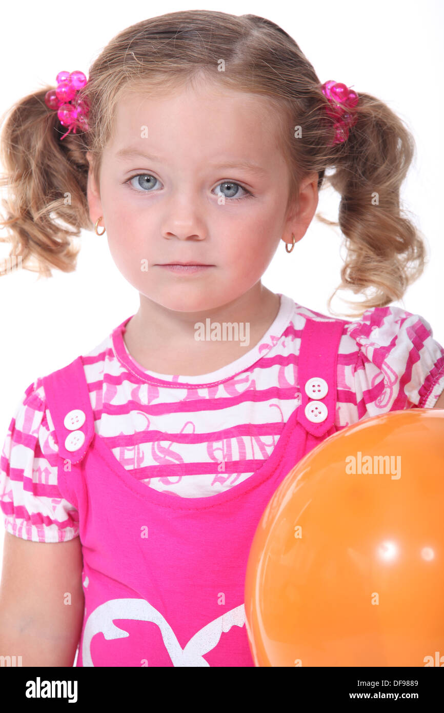 Little girl with orange balloon Stock Photo Alamy