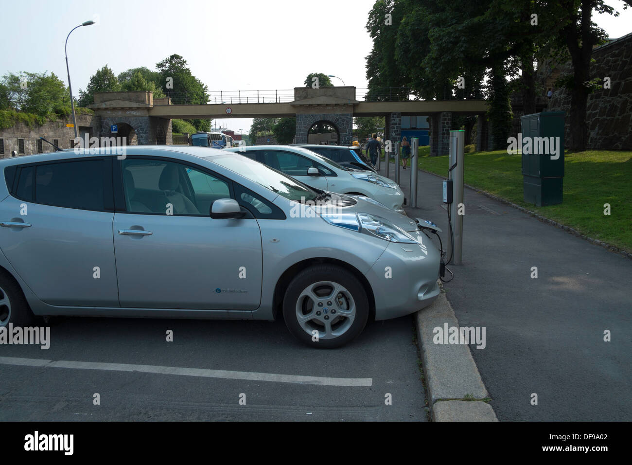 Electric cars being recharged at street charging stations, Norway, Oslo