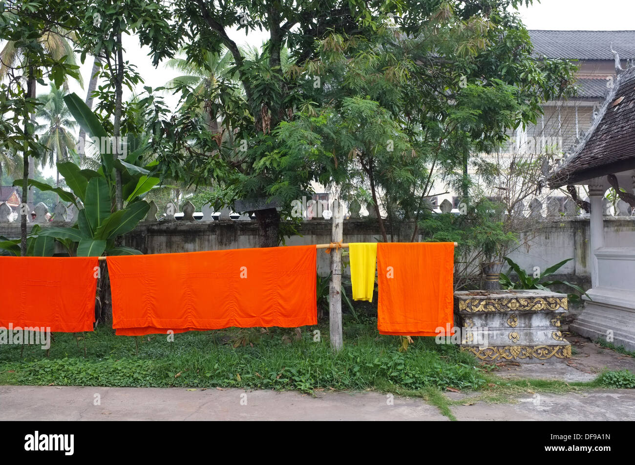 Monks' robes drying outdoors at temple in Luang Prabang, Laos. Stock Photo