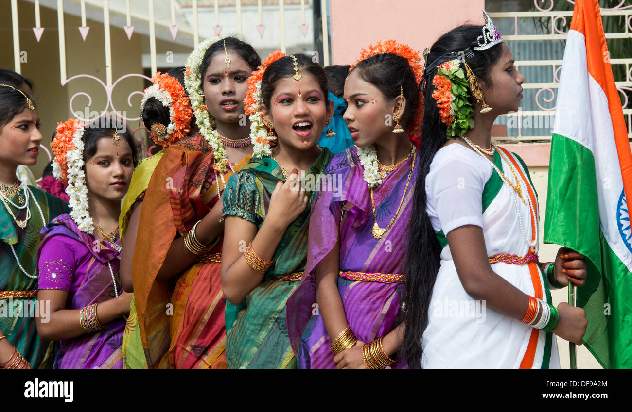 Indian girls dressed in traditional costumes dancing at a protest rally. Puttaparthi, Andhra Pradesh, India Stock Photo