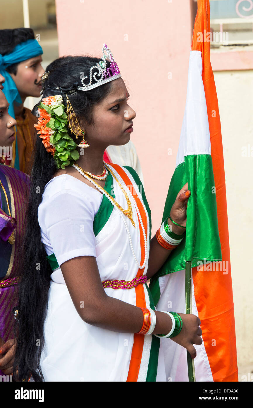 Indian girl dressed in indian flag sari at a protest rally. Puttaparthi, Andhra Pradesh, India Stock Photo