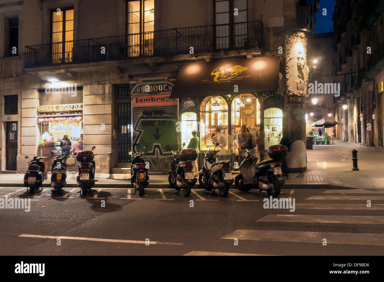 BARCELONA, SPAIN - SEPTEMBER 11, 2013: Pretty Street corner night scene on La Rambla Barcelona Les Rambles Stock Photo
