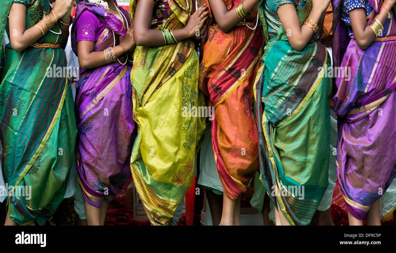 Indian girls dressed in traditional colourful silk saris at a protest rally. Puttaparthi, Andhra Pradesh, India Stock Photo