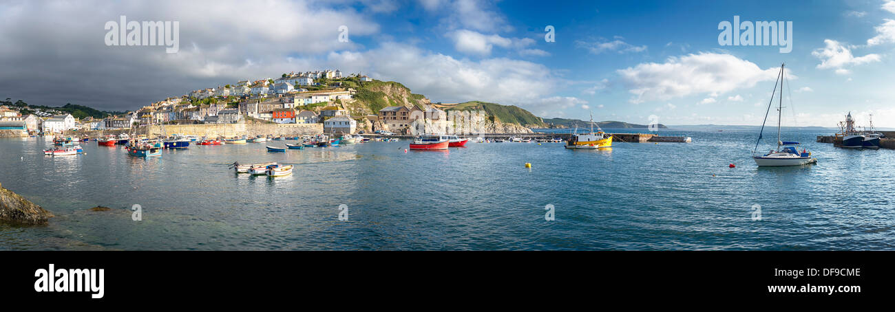 Storm clouds gather over Mevagissey an historic fishing port in Cornwall Stock Photo