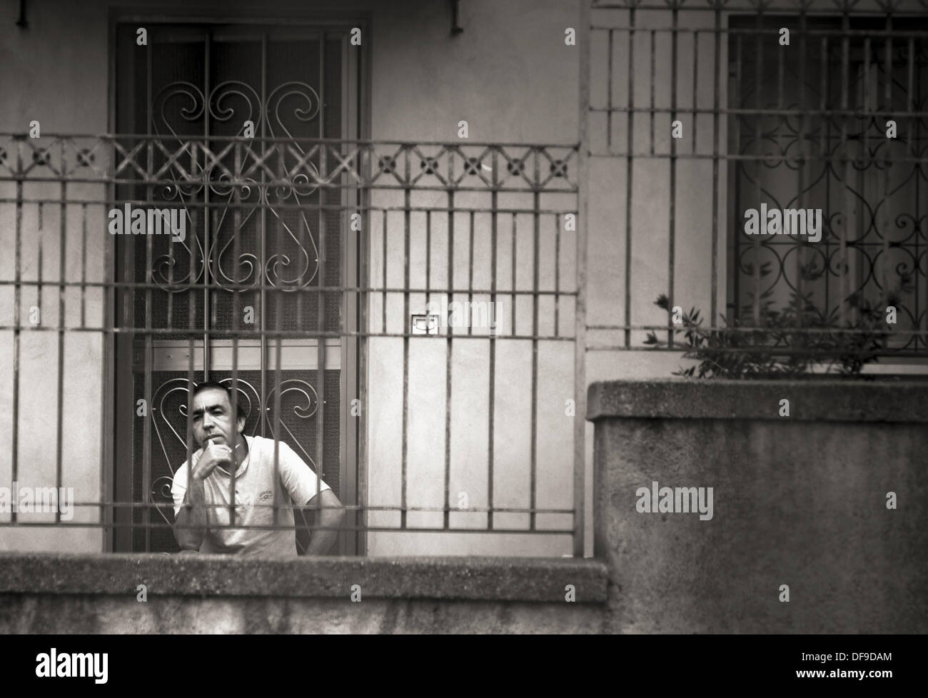 Italian man on porch in Sicily Stock Photo Alamy