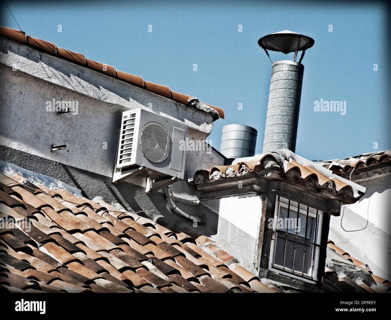 Roof of a house equipped with air conditioning Stock Photo Alamy