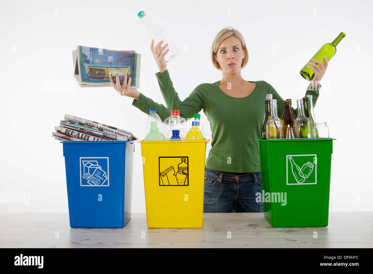 Woman with three arms recycling Stock Photo Alamy