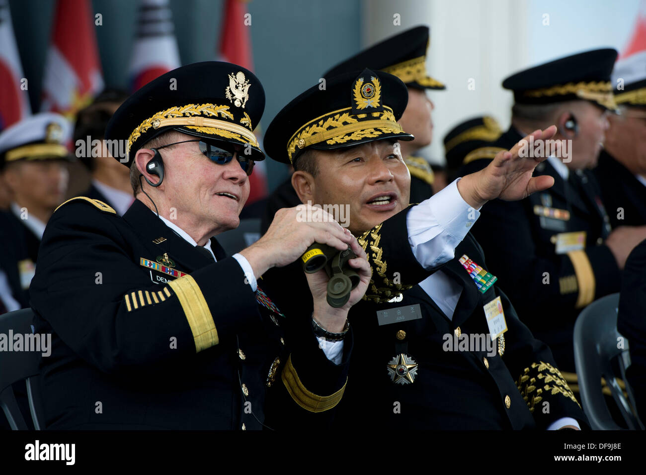 US Chairman of the Joint Chiefs General Martin Dempsey stands with South Korea General Jung Seung-jo during the ROK Armed Forces Parade October 1, 2013 in Seoul, Republic of Korea. The military parade commemorates the anniversary of the ROK-U.S. Alliance. Stock Photo