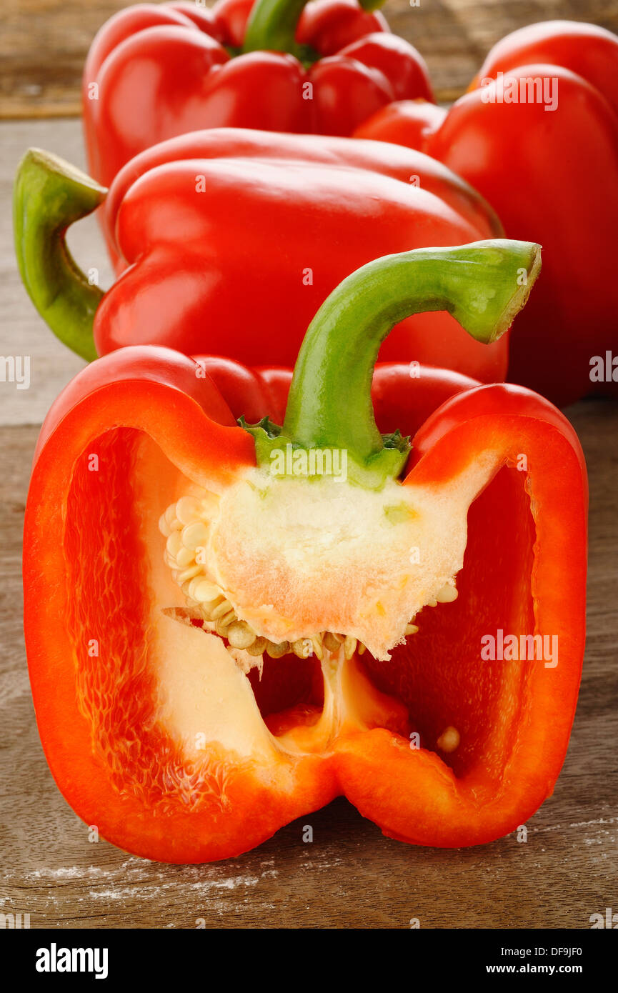 Fresh red pepper on wooden background Stock Photo