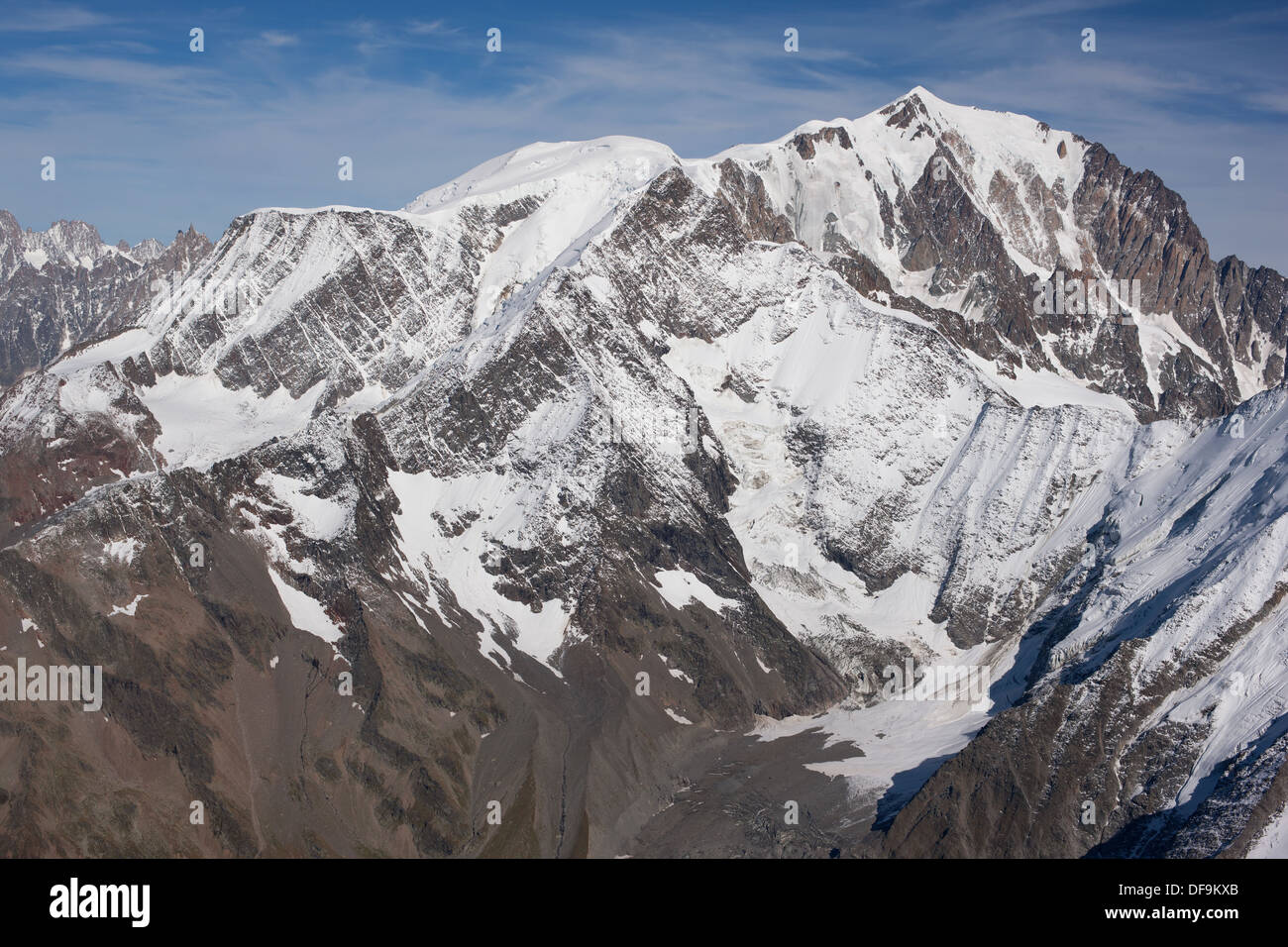 AERIAL VIEW. Left to right: Aiguille du Goûter (3863m), Dome du Goûter (4304m), Mont Blanc (4810m). Saint-Gervais, Auvergne-Rhône-Alpes, France. Stock Photo