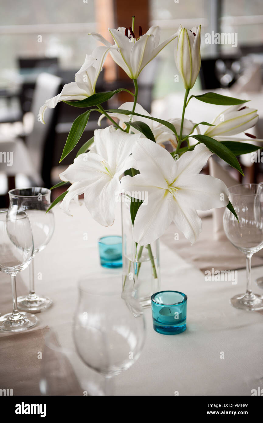 White Lilium Lily flowers in glass vase Stock Photo - Alamy