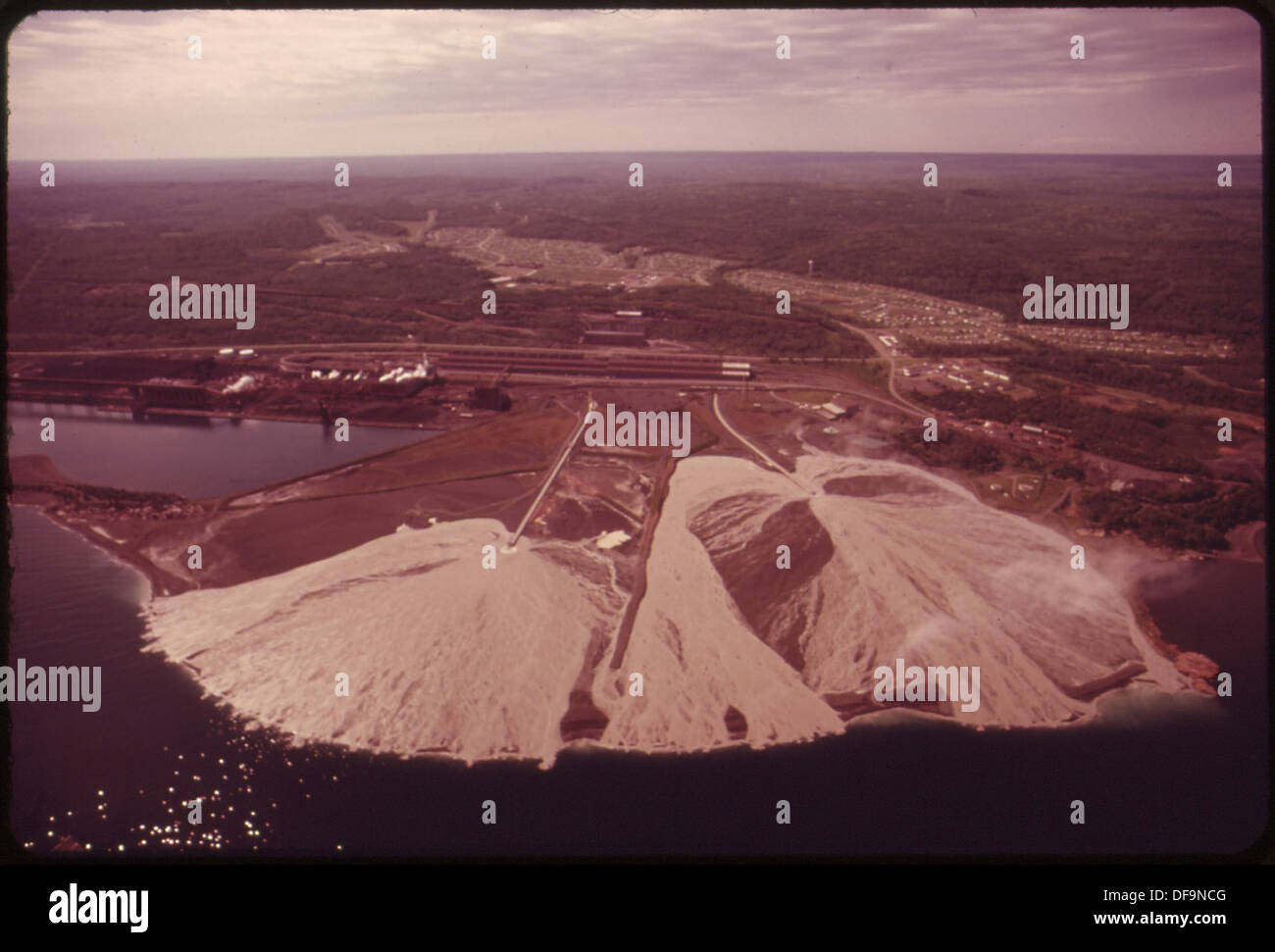 TACONITE TAILINGS FROM RESERVE MINING AT SILVER BAY ARE DISCHARGED INTO
