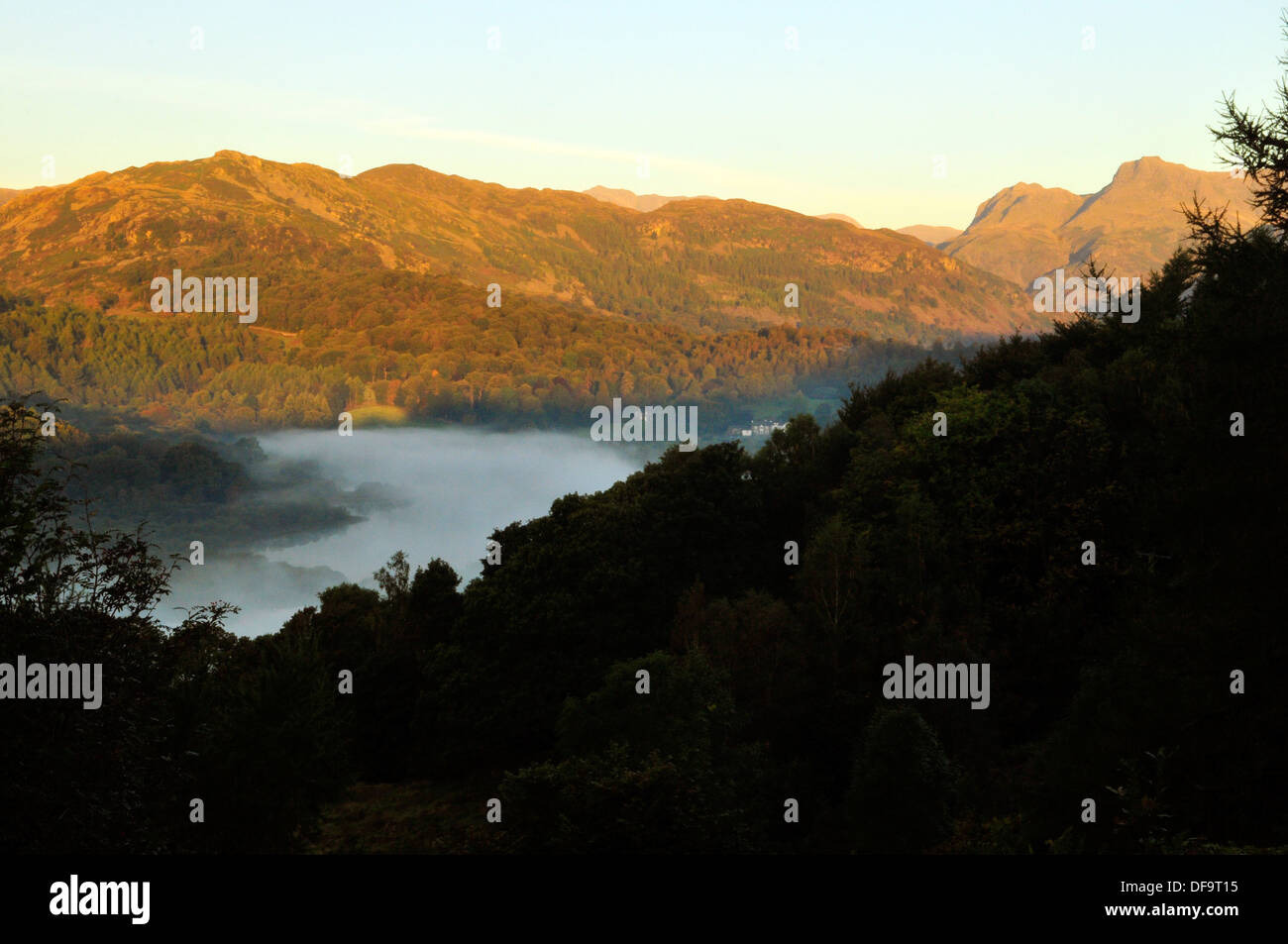 Misty Valley Mountains Stock Photo - Alamy