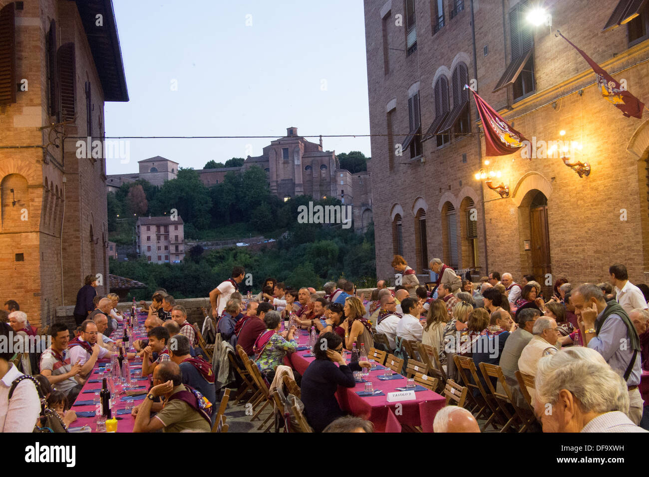 'Torre'  (Tower) contrada (district) meal after the general Palio trial, the evening before the Palio, Siena, Tuscany, Italy Stock Photo