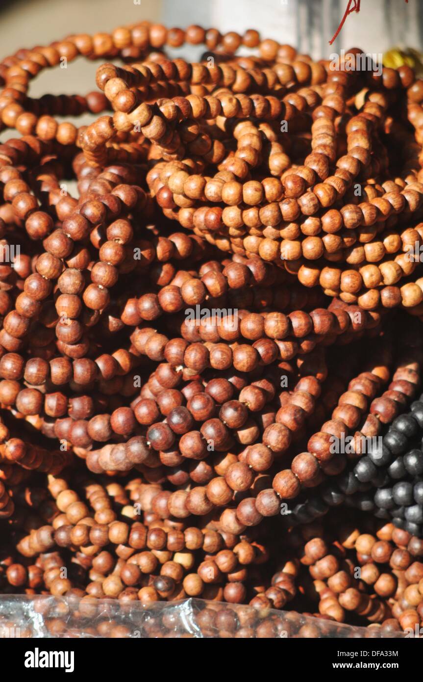 Mae Sai (Thailand): Buddhist rosaries sold along the street to the Wat Phra That Doi Wao temple Stock Photo