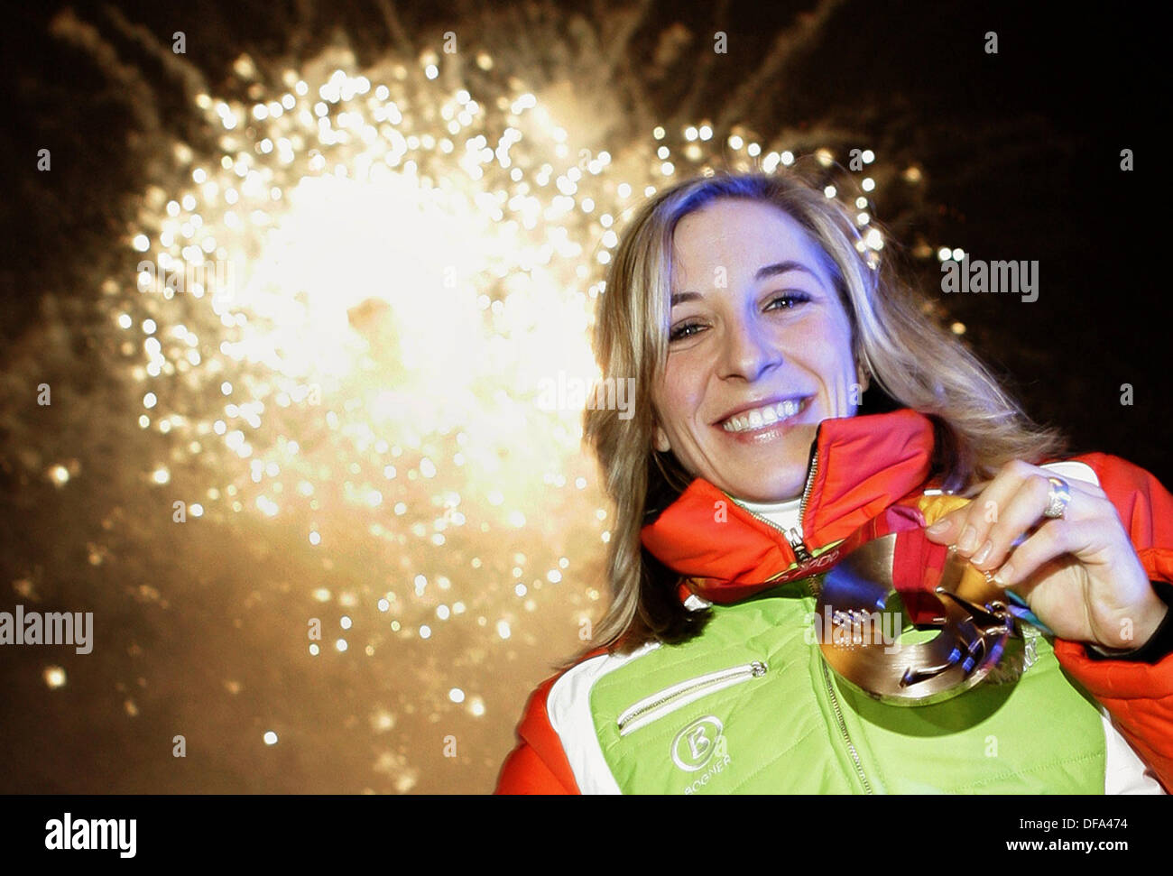 Ice speed skater Anni Friesinger presents her bronze medal in Turin on the 20th of February in 2006. Stock Photo