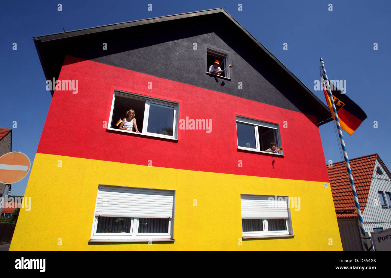 On the occasion of the soccer world championship 2006, family Arnold has painted their house in the German national colours on the 13th of June in 2006. Stock Photo