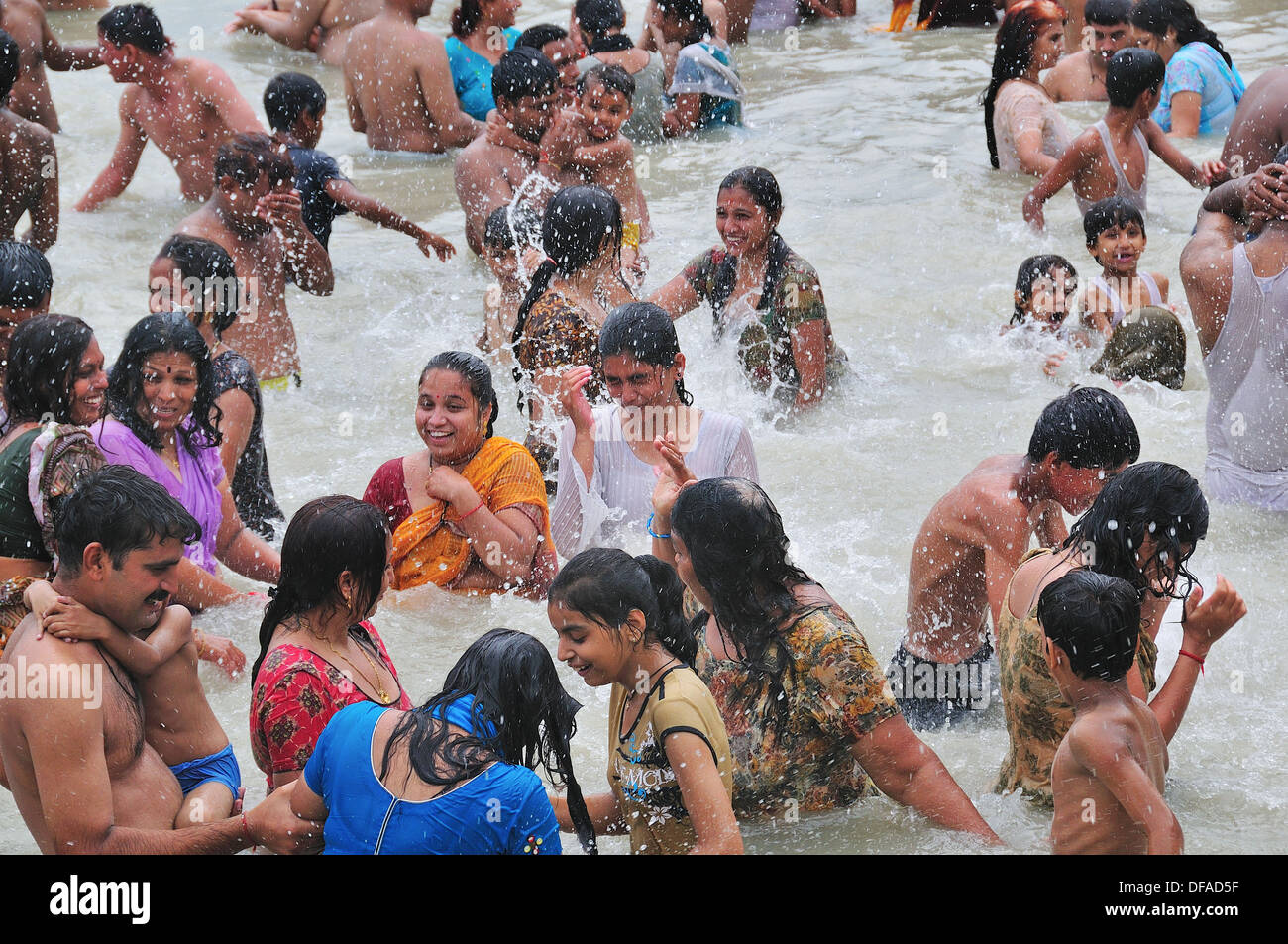 Pilgrims bathing at Har Ki Pairi ghat in the Ganges River 