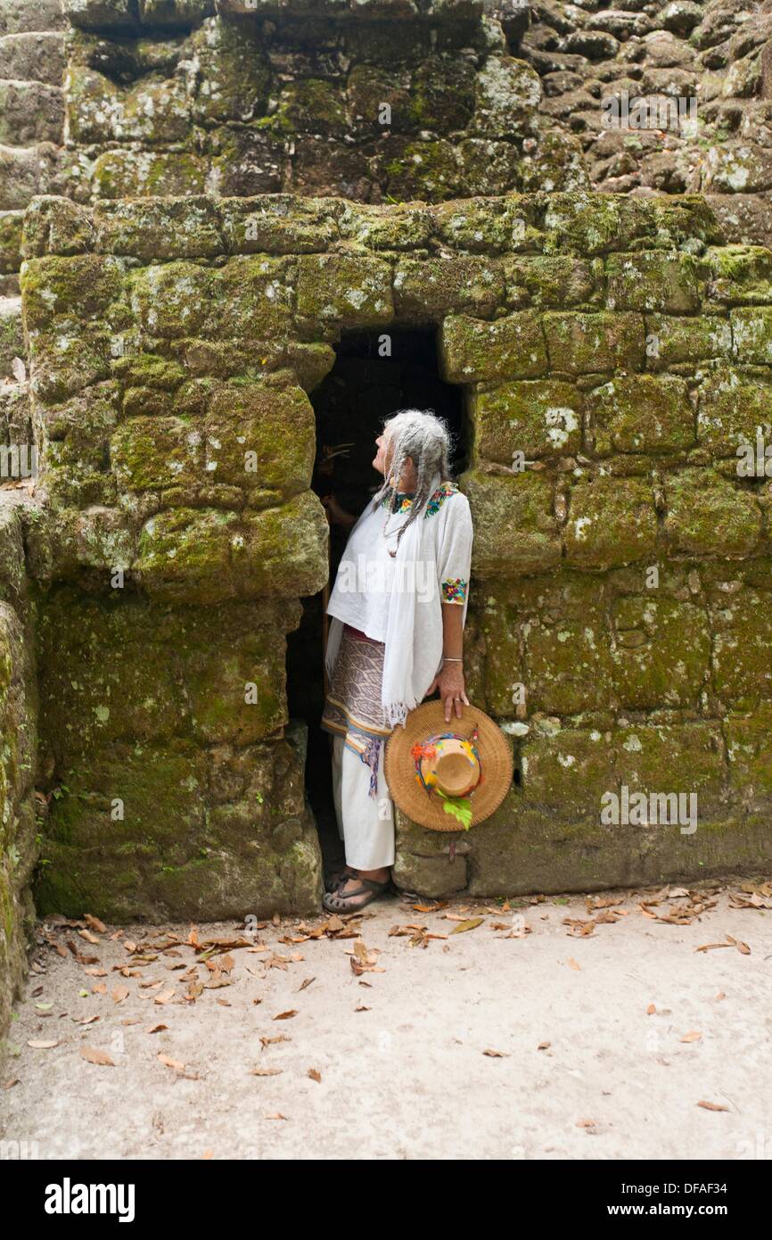 Guatemala, Tikal, Shaman in temple doorway Stock Photo Alamy