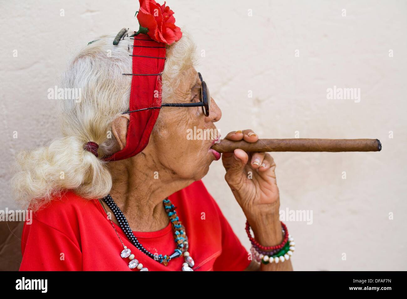 Cuba, Old woman smoking cigar Stock Photo