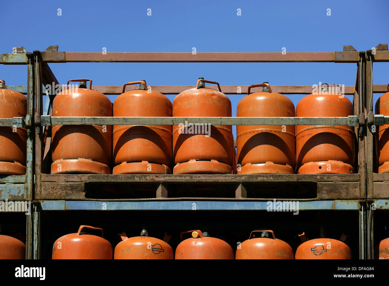 Stacked Butano Gas orange containers Stock Photo Alamy