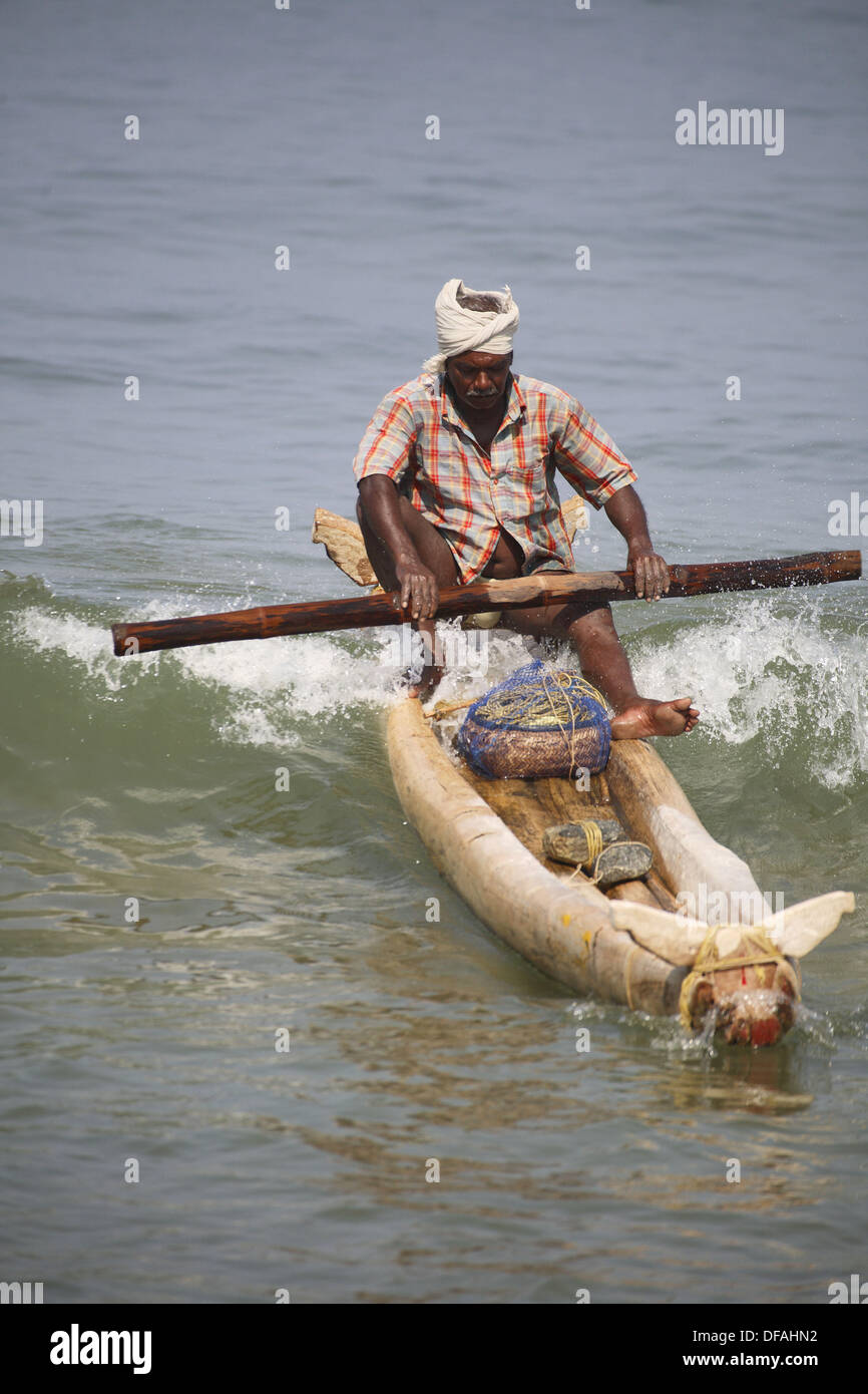 Fisherman in canoe, Kovalam, Kerala, India Stock Photo Alamy
