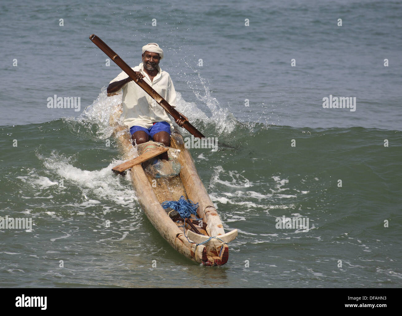 Fisherman in canoe, Kovalam, Kerala, India Stock Photo Alamy