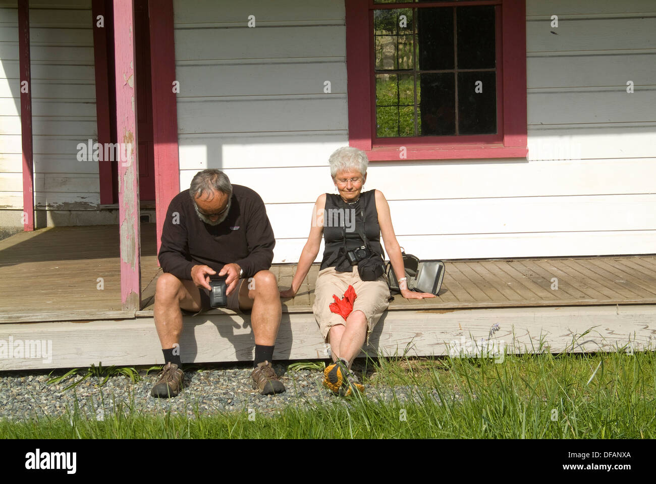 Older couple sitting on porch hi-res stock photography and images - Alamy