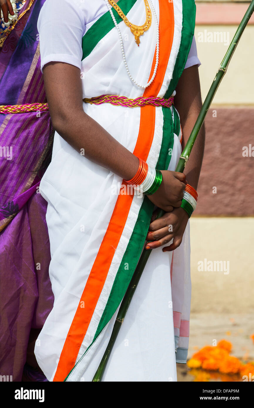 Indian girl dressed in indian flag sari at a protest rally. Puttaparthi, Andhra Pradesh, India Stock Photo