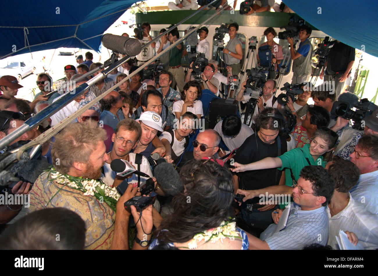Master of the RAINBOW WARRIOR Jon Castle holds a press conference aboard the Warrior in Tahiti, en route to Moruroa to protest Stock Photo