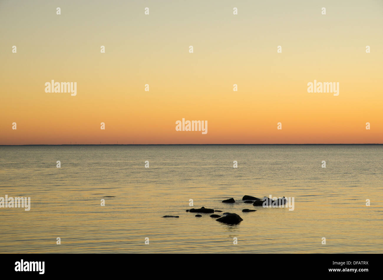 Seaside view at sunset by the coast of the Baltic sea at the swedish island Oland. Stock Photo