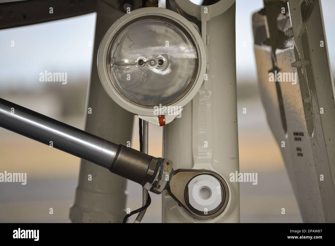 Aircraft landing light mounted on main landing gear of private general aviation aircraft Stock Photo