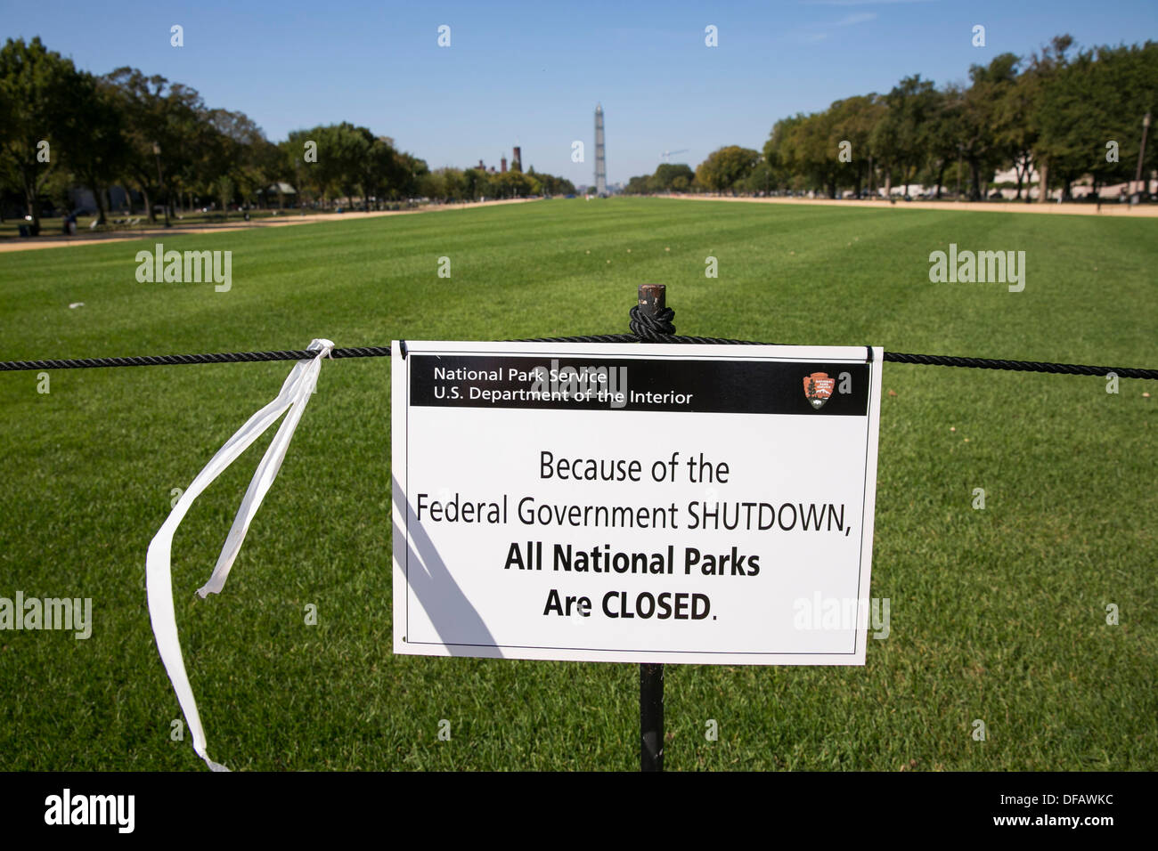 Washington DC, USA. 01st Oct, 2013. A portion of the National Mall with the Washington Monument in the background is closed due to the government shutdown on October 1, 2013 in Washington, DC. The US Federal Government shut down at midnight after Congress was unable to pass a funding bill over a dispute to defund Obamacare. Credit:  Kristoffer Tripplaar/Alamy Live News Stock Photo
