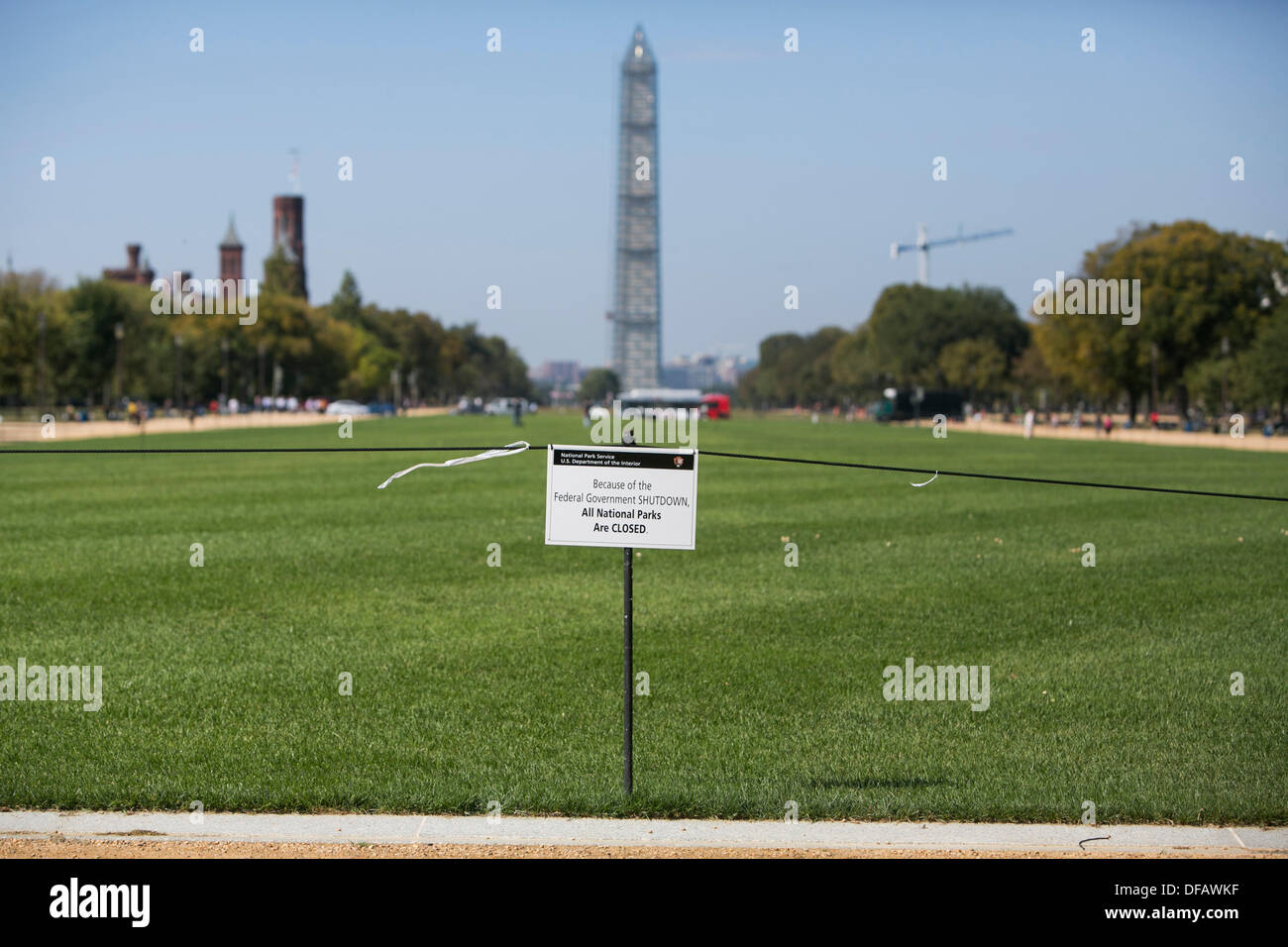 Washington DC, USA. 01st Oct, 2013. A portion of the National Mall with the Washington Monument in the background is closed due to the government shutdown on October 1, 2013 in Washington, DC. The US Federal Government shut down at midnight after Congress was unable to pass a funding bill over a dispute to defund Obamacare. Credit:  Kristoffer Tripplaar/Alamy Live News Stock Photo