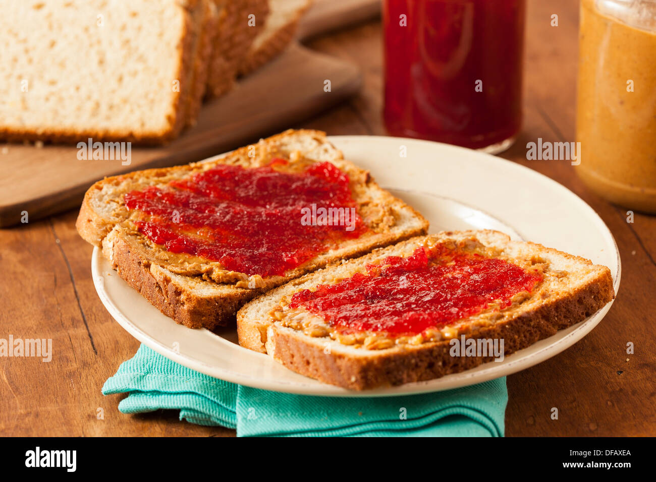 Homemade Peanut Butter and Jelly Sandwich on Whole Wheat Stock Photo