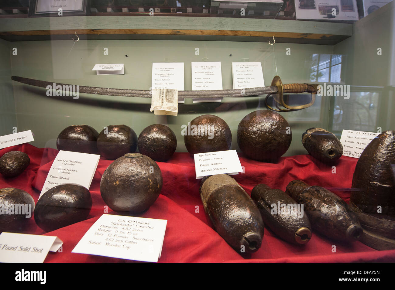 Civil War sword and cannon balls ball ammo ammunition exhibits at Port of O'Plymouth Roanoke River Museum Plymouth North Carolina, USA. Stock Photo