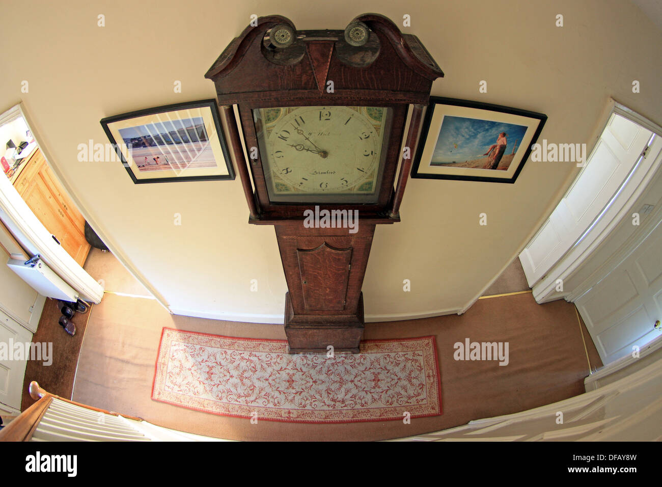 Grandfather clock in house hallway Stock Photo Alamy