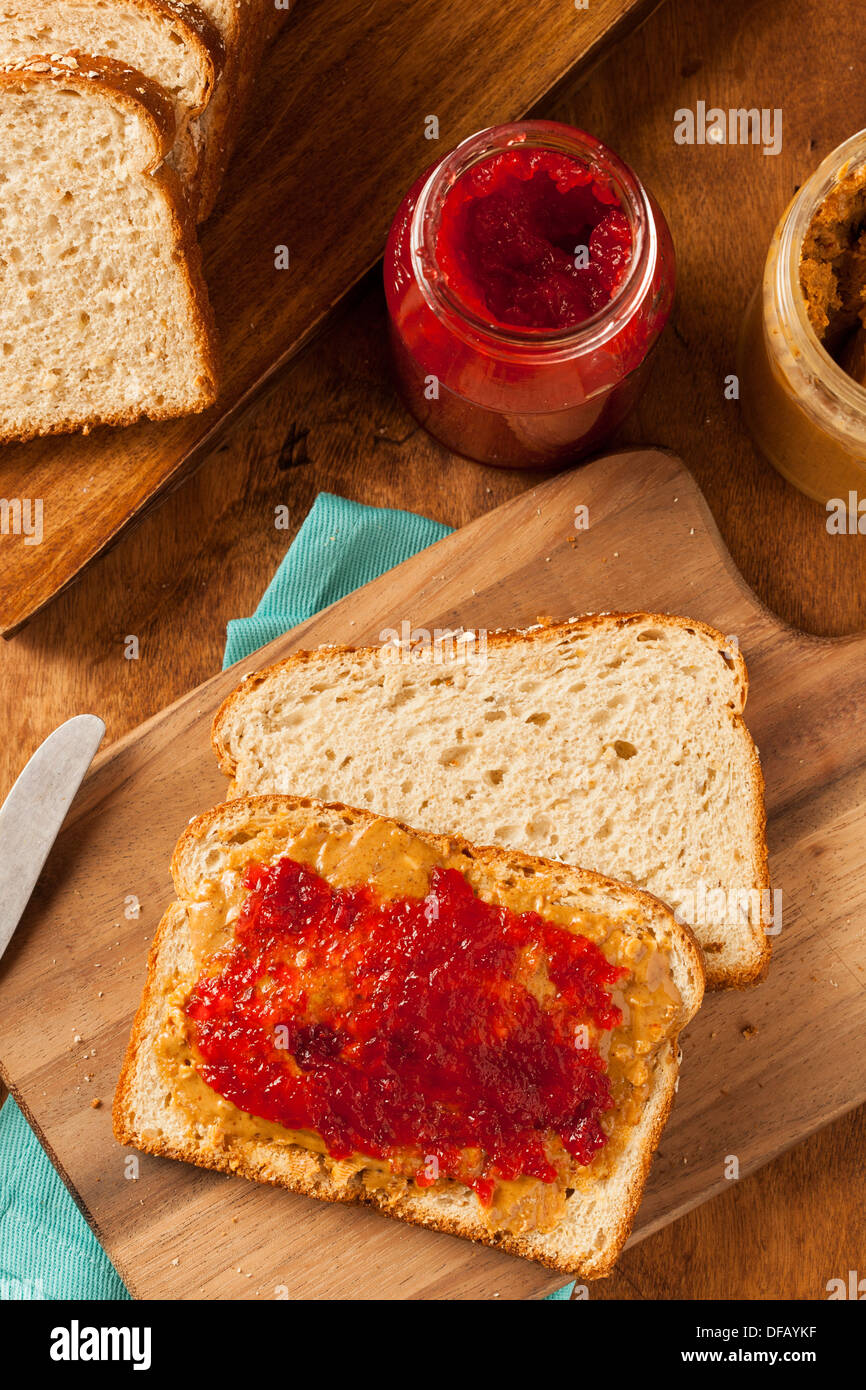Homemade Peanut Butter and Jelly Sandwich on Whole Wheat Stock Photo