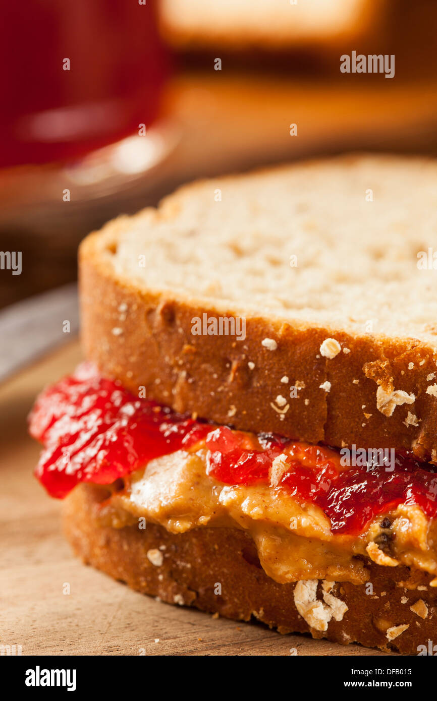 Homemade Peanut Butter and Jelly Sandwich on Whole Wheat Stock Photo