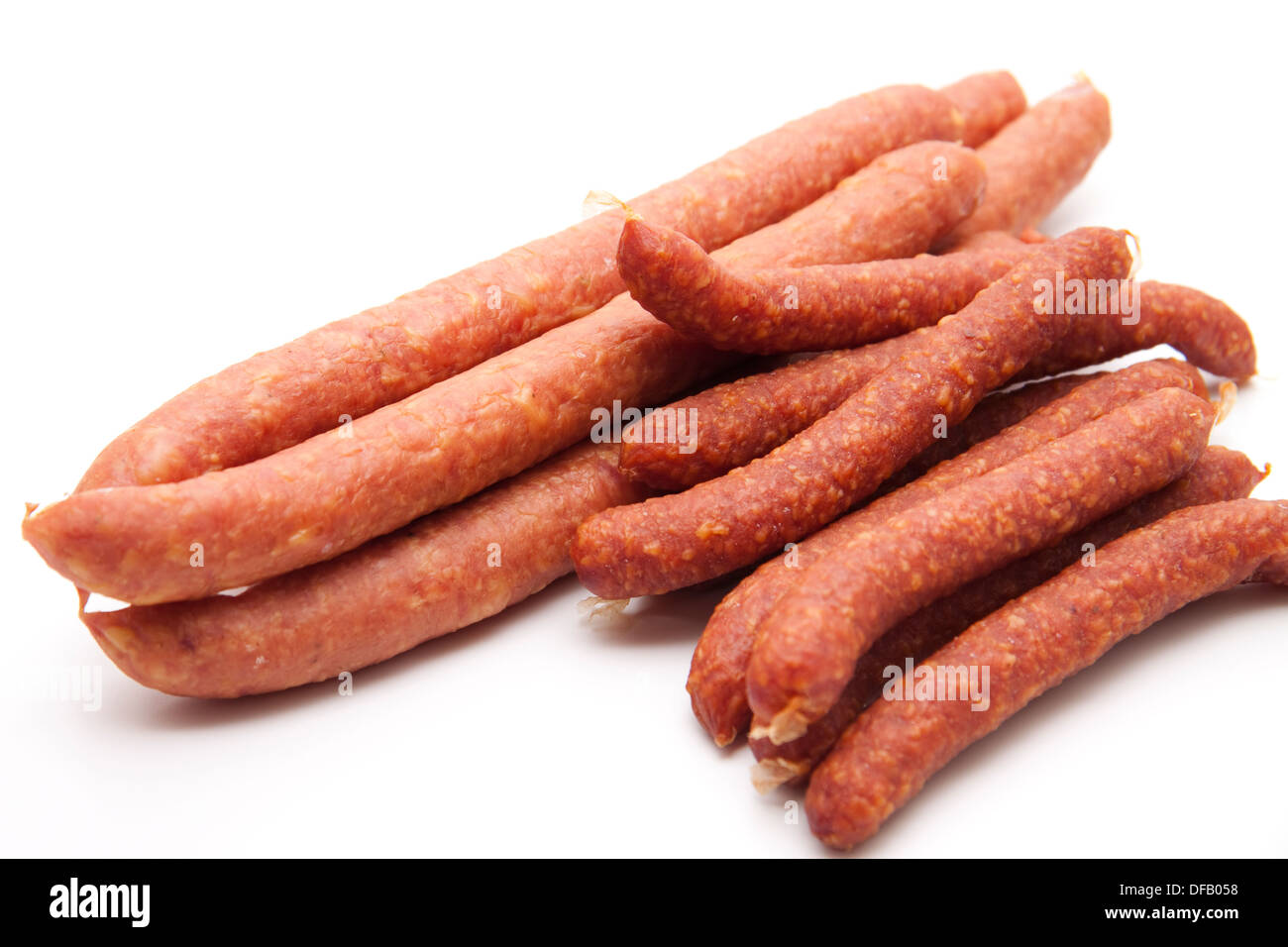 Fresh Cold Salami Sausages on white background Stock Photo Alamy