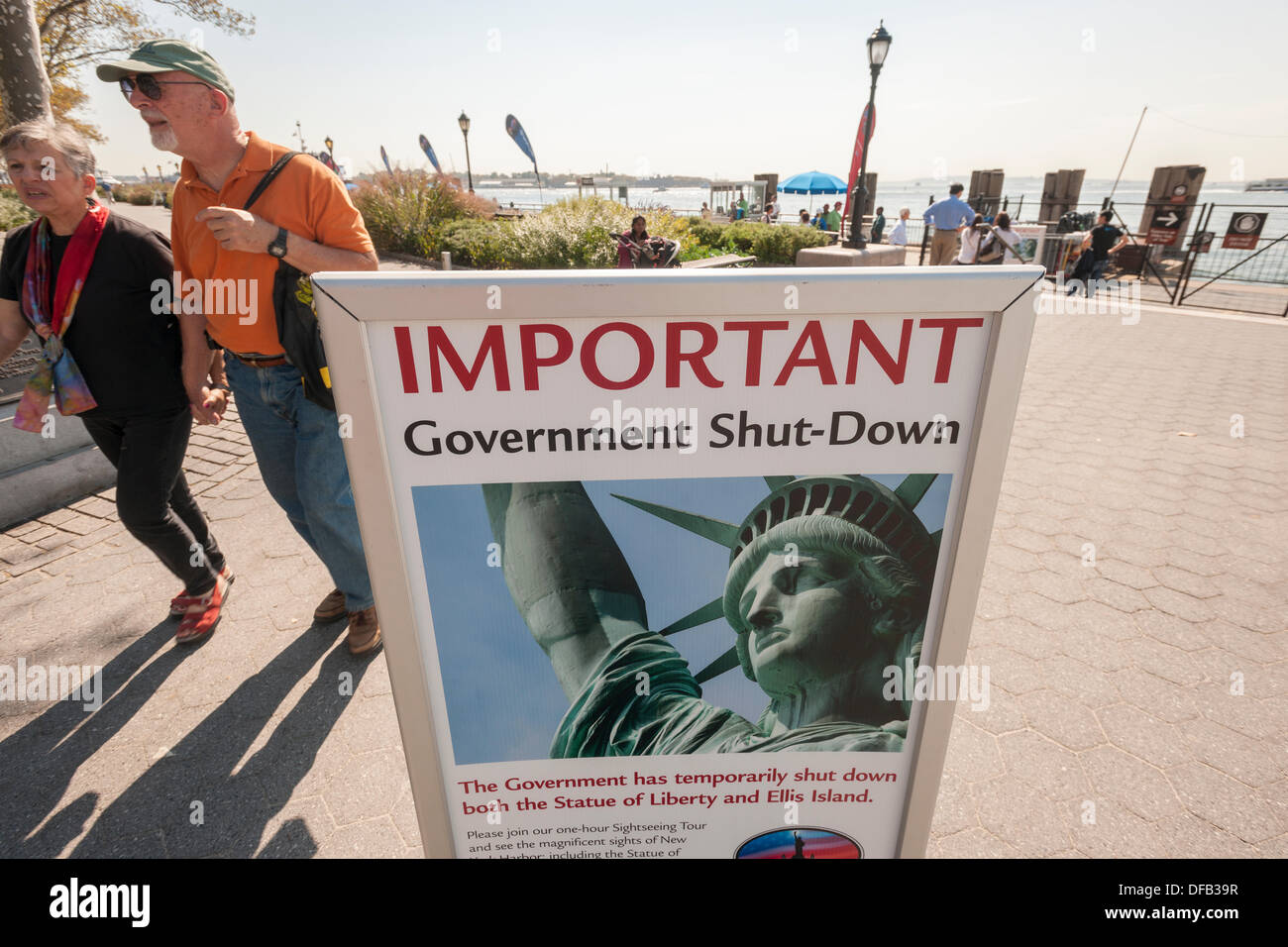 New York, USA. 1st October 2013. A sign in Battery Park in New York where ferries to the Statue of Liberty launch informs tourists that the statue is closed, seen on Tuesday, October 1, 2013. A partial government shutdown took effect today because of a dispute between Democrats and Republicans in Congress over the Obamacare program. Approximately 800,000 federal workers have been furloughed and only essential services are up and running.  Credit:  Richard B. Levine/Alamy Live News Stock Photo