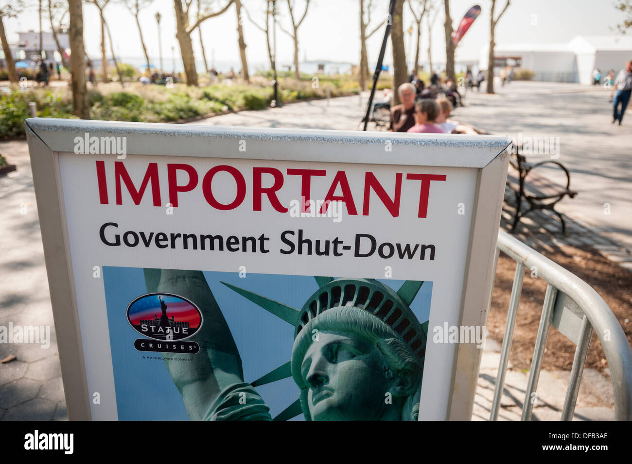 New York, USA. 1st October 2013. A sign in Battery Park  in New York where ferries to the Statue of Liberty launch informs tourists that the statue is closed, seen on Tuesday, October 1, 2013. A partial government shutdown took effect today because of a dispute between Democrats and Republicans in Congress over the Obamacare program. Approximately 800,000 federal workers have been furloughed and only essential services are up and running.  Credit:  Richard B. Levine/Alamy Live News Stock Photo