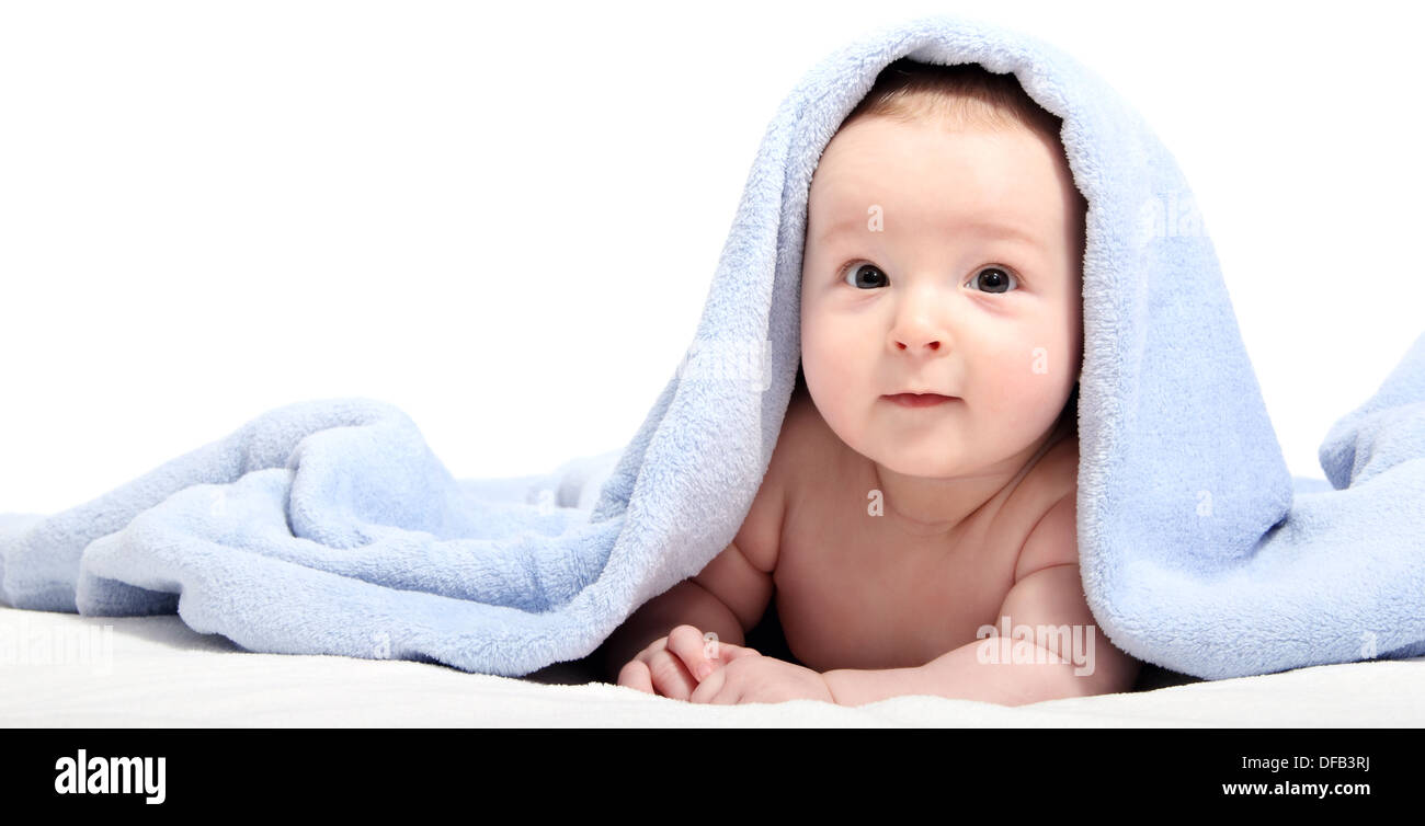 beautiful baby after bath under a blanket Stock Photo