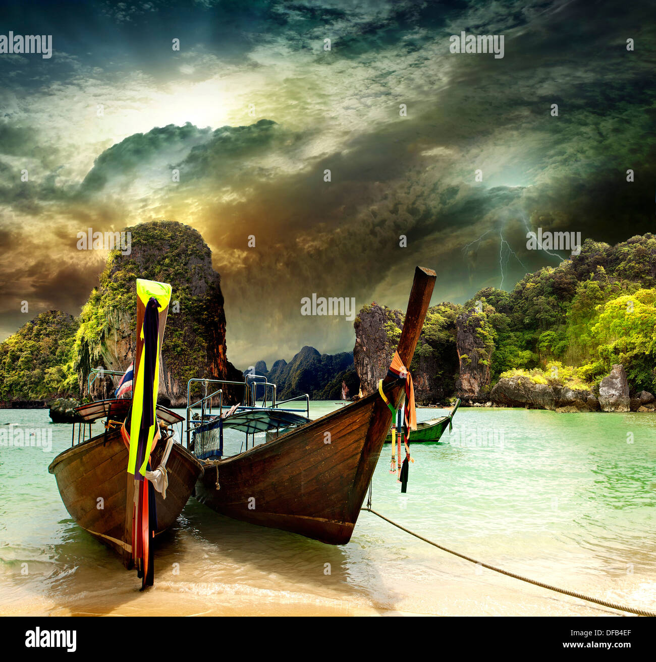 Traditional Thai boat on the shore of the Andaman Sea. TPhiphi island. monsoon Stock Photo