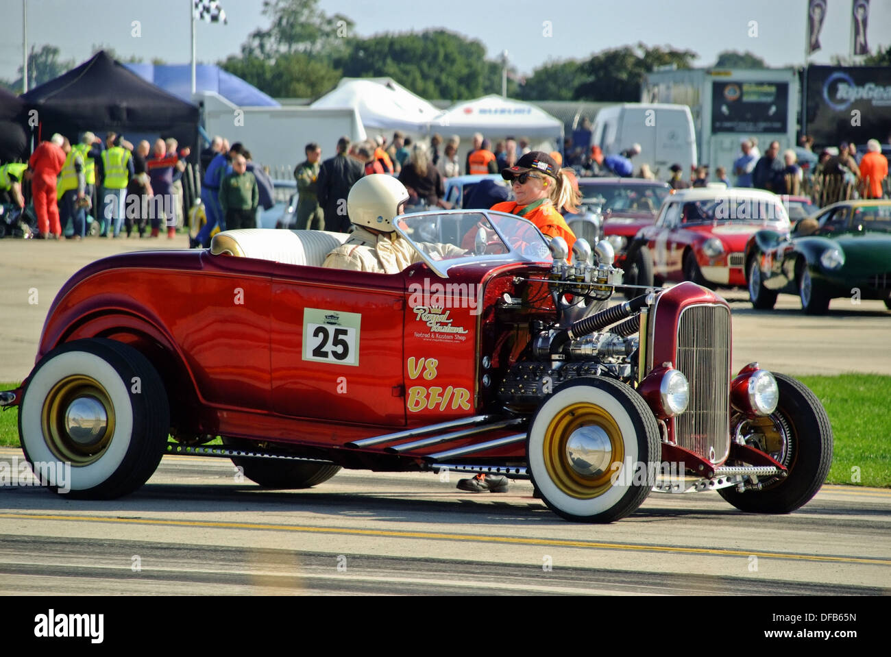 Marshal talking to Hot Rod Driver at race Meeting Stock Photo