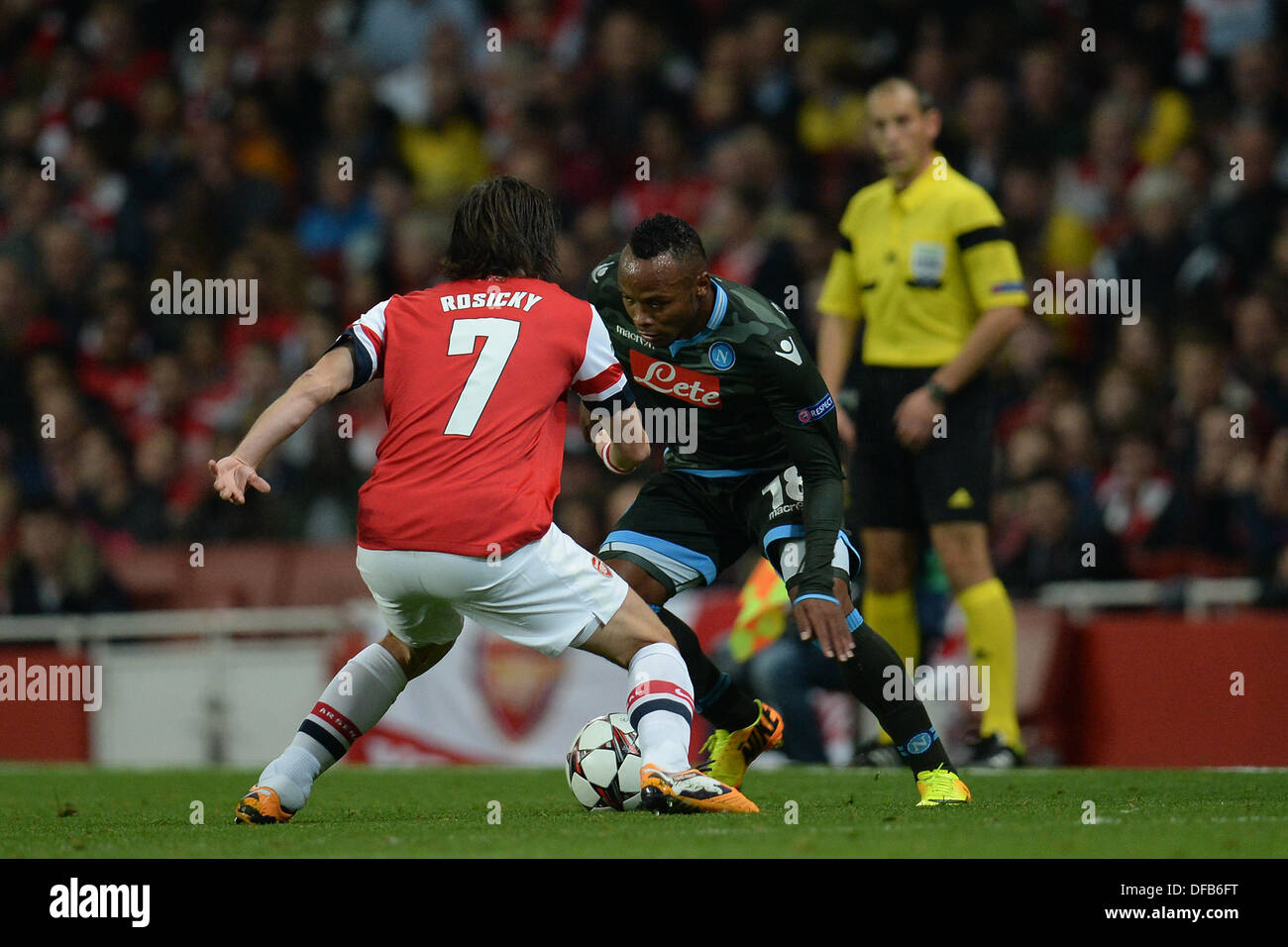 London, UK. 01st Oct, 2013. Arsenal's midfielder Tomas Rosicky from The Czech Republic and Napoli's defender Camilo Zuniga from Columbia during the UEFA Champions League match between Arsenal from England and Napoli from Italy played at The Emirates Stadium, on October 01, 2013 in London, England. © Mitchell Gunn/ESPA/Alamy Live News Stock Photo