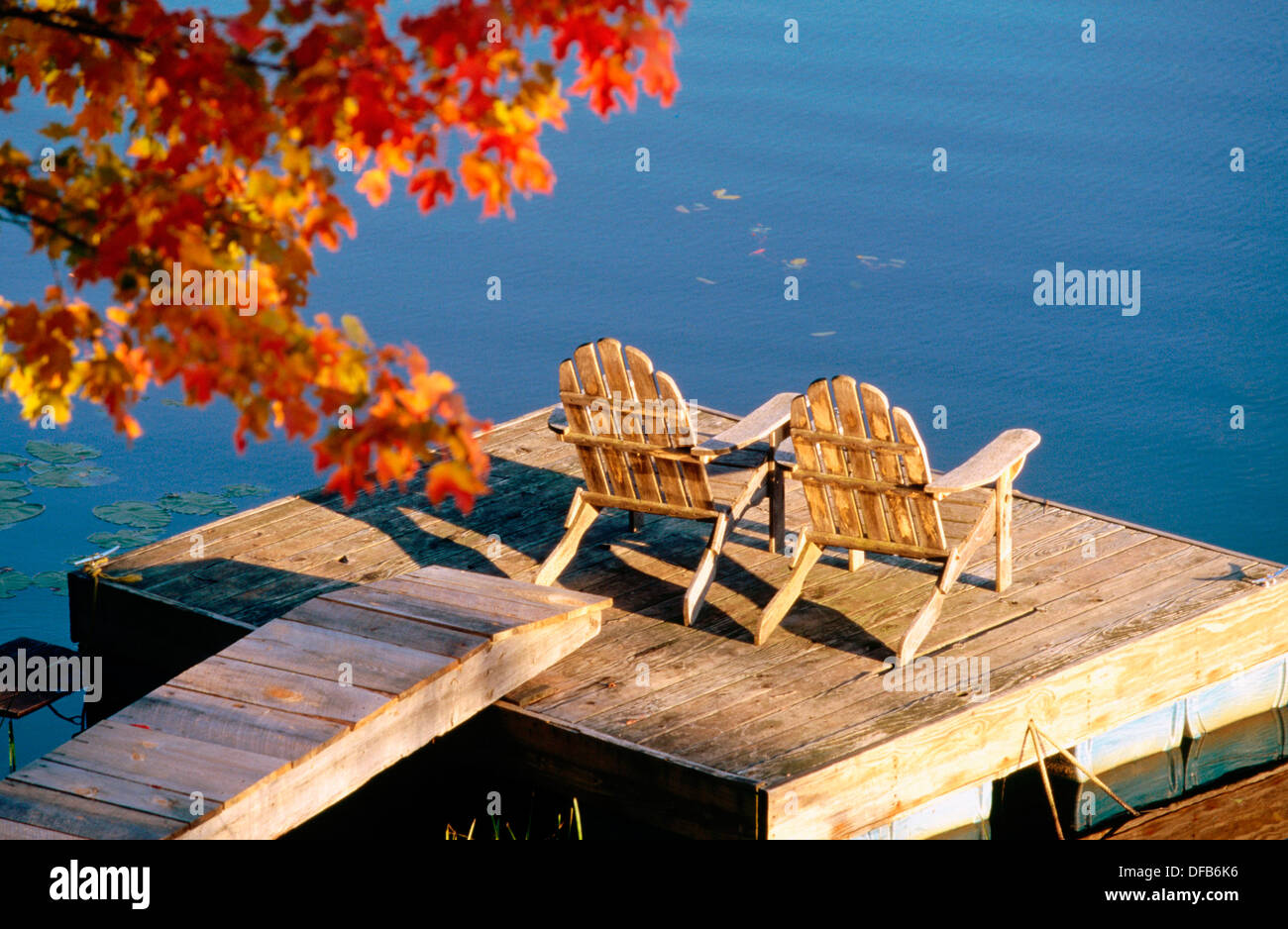 Adirondack chairs in a dock in autumn. Starlight. Pennsylvania. USA