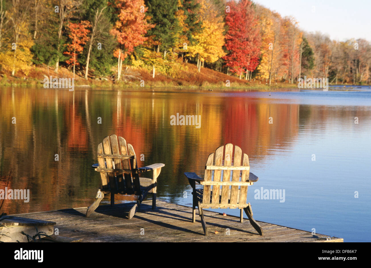Adirondack chairs in a dock in autumn. Starlight. Pennsylvania. USA