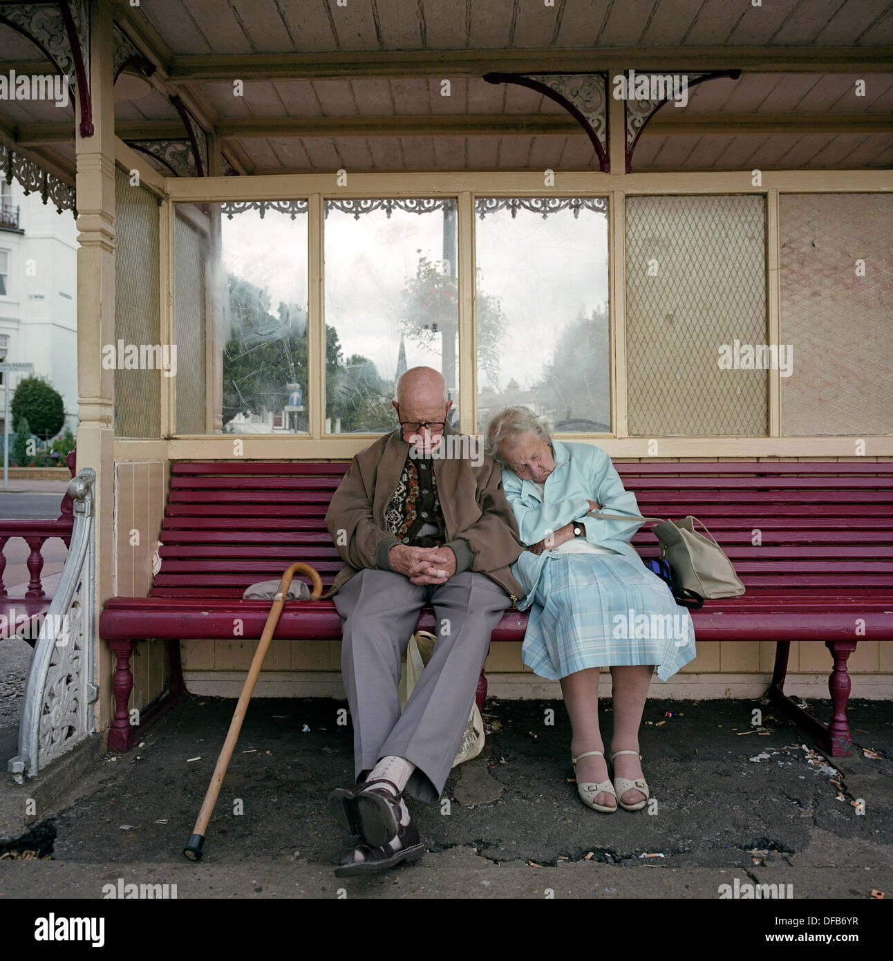 Old couple sleeping on bench hi-res stock photography and images - Alamy